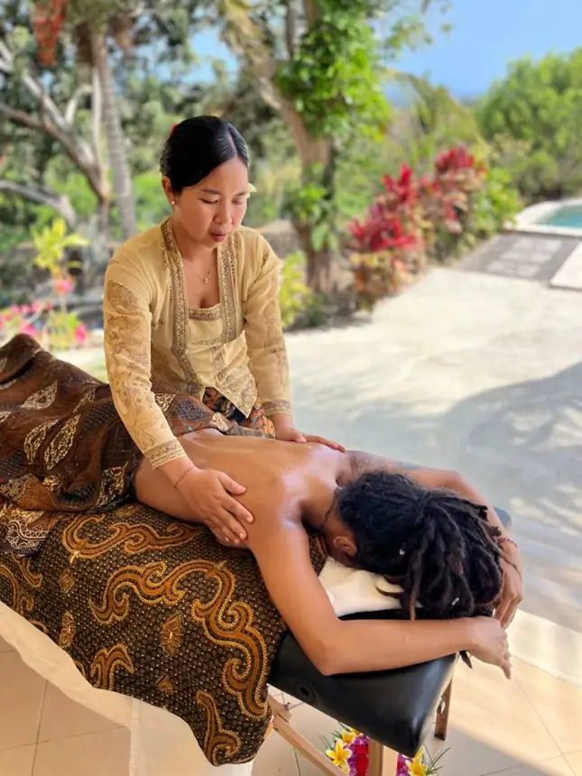 Abhyanga massage on a private terrace